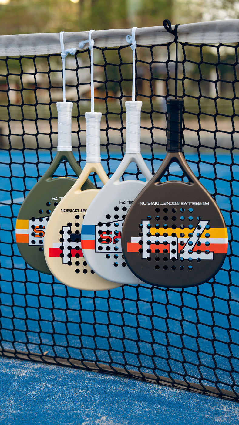 Farrellys padel racket and track jacket at the net, Dubai